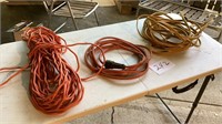 3= extension cords, one, lol orange one, short,
