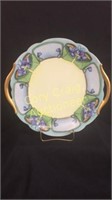 Hand painted bread plate with gold trim. Ca. 1916