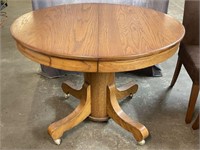 Oak Pedestal Dining Table on Casters
