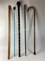 Wooden canes one with curved handle, African