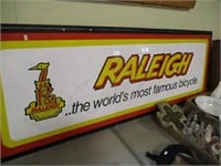 RALEIGH PLASTIC SIGN W/ METAL FRAME