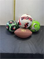 Wilson NFL Football and 4 soccer balls