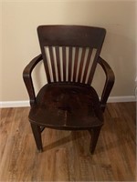 Antique wooden arm chair