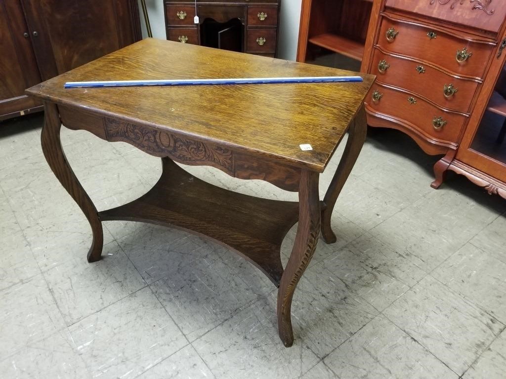 OAK LIBRARY TABLE W/ CARVED SKIRT AND LEGS