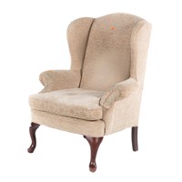 Queen Anne style mahogany upholstered wing chair