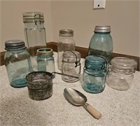 Jars w/ lids, sifter and scoop.