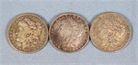 (3) Morgan Silver Dollars