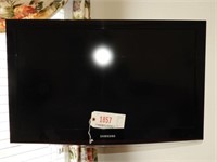 2010 Samsung model LN 32” flat screen TV with wall