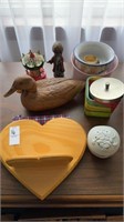 Wooden duck statue, assortment of candles, etc