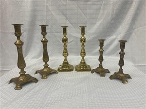 3 pairs of brass candle sticks 8.5”-11”