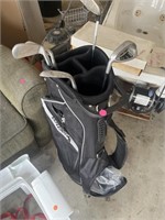 Golf bag with a few clubs