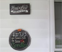 Various signs & clock on porch