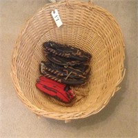 basket with baseball gloves