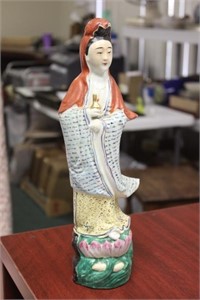A Chinese Porcelain Figure of a Kwan Yin