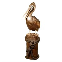 Pelican Standing on Post