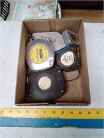 Group of tape measures with chalk line