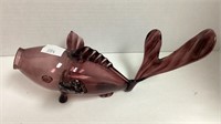 Purple Fish decanter. Note blemishes around the