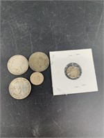Mixed silver coinage, mostly Canadian, some Dutch,