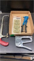 Hack saw, stapler, rivet gun & rivet pack