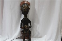 An African Wooden Seated Man