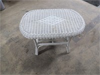 Small oval wicker table.