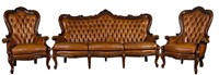 ITALIAN CARVED WALNUT AND LEATHER SOFA AND CHAIR