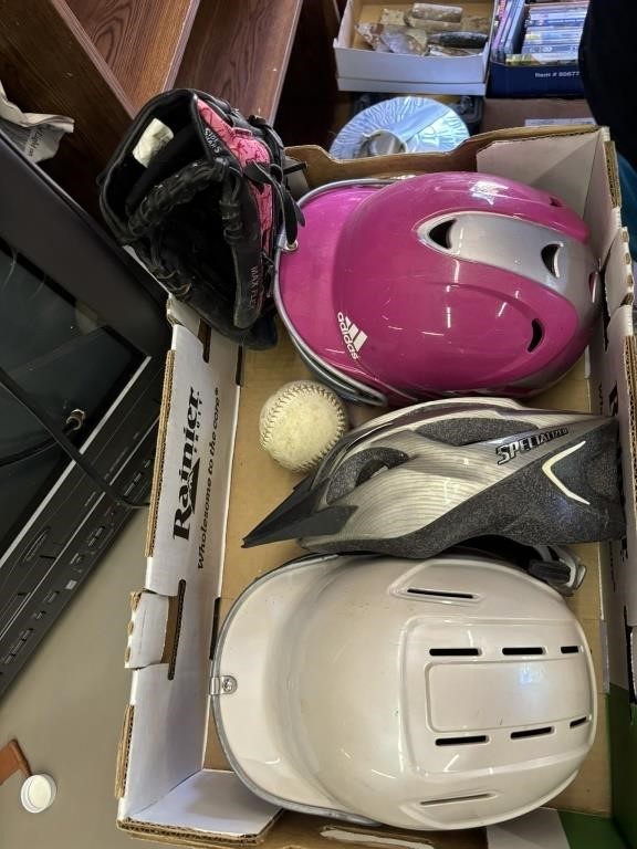 softball glove, ball 2 helmets and 1 bike helmet