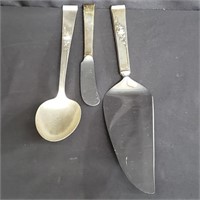 Sterling silver spoon and sterling-handled