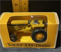 John Deere tractor in box plastic is torn