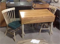 Wood drop leaf table with two chairs with seat