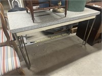 Mid-century formica table with metal legs, some