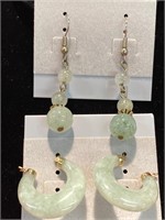 Two pair of pierced earrings. Pale green stones