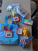Assortment of kid's party supplies and balloons