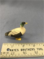 2 1/2" carved ivory bird with baleen feet and beak