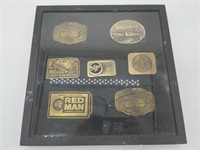 Belt Buckle Display with Red Man, Starrett, and