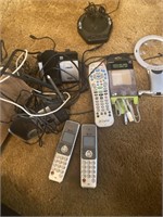 Random electronics cords, phone bases, remotes,