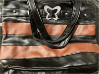Brown and black purse with diamond butterfly