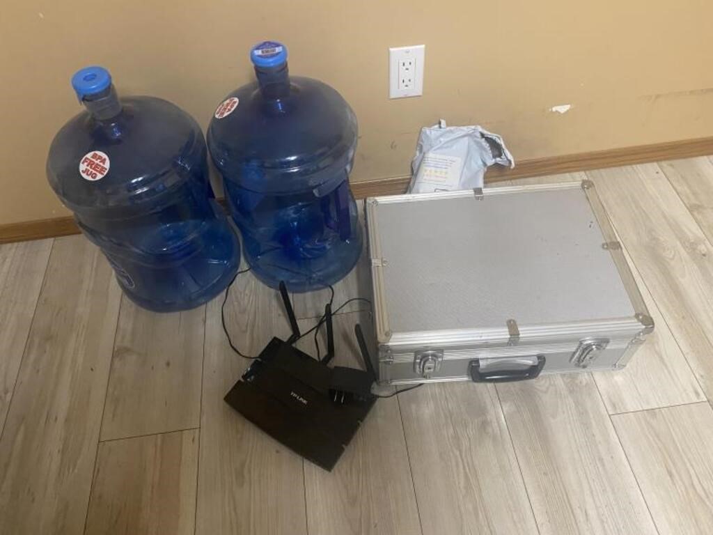 water jugs, empty case, wifi router