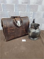 Vintage brief case and silver plated water jug