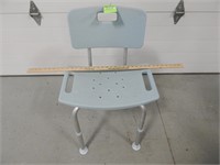 Adjustable height shower chair