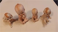 4 Kewpie Dolls