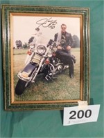 Harry Gant autographed 8x10 sitting on Harley