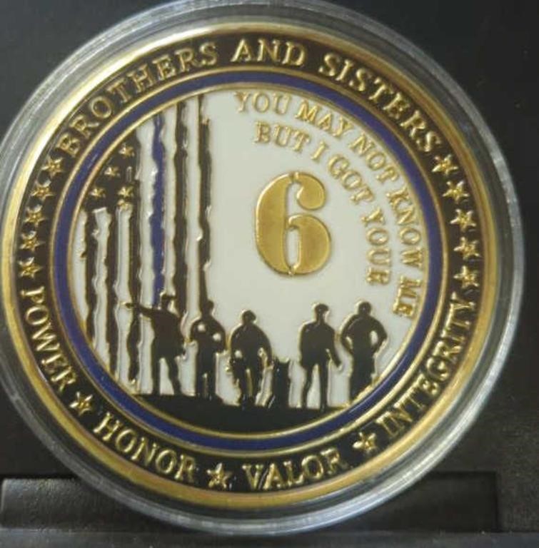 Police challenge coin