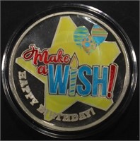 ONE OZ . 999 ENAMELED MAKE A WISH SILVER ROUND