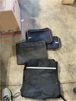 lot of travel and computer bags