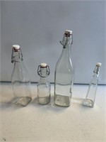 4- mid century glass bottle containers with flip
