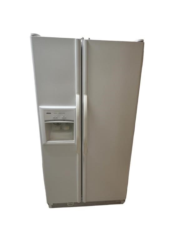 A Kenmore Side By Side Refrigerator/Freezer