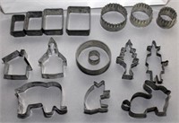 (38) tin cookie cutters including graduated