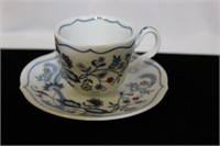 An Avon Cup and Saucer