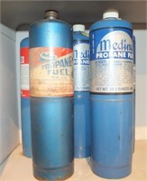 5 PROPANE CANS